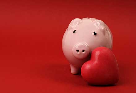 pink porcelain pig with a heart in front